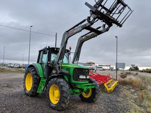 tractor John Deere 6620 con pala Mx 120