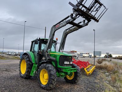 tractor John Deere 6620 con pala Mx 120